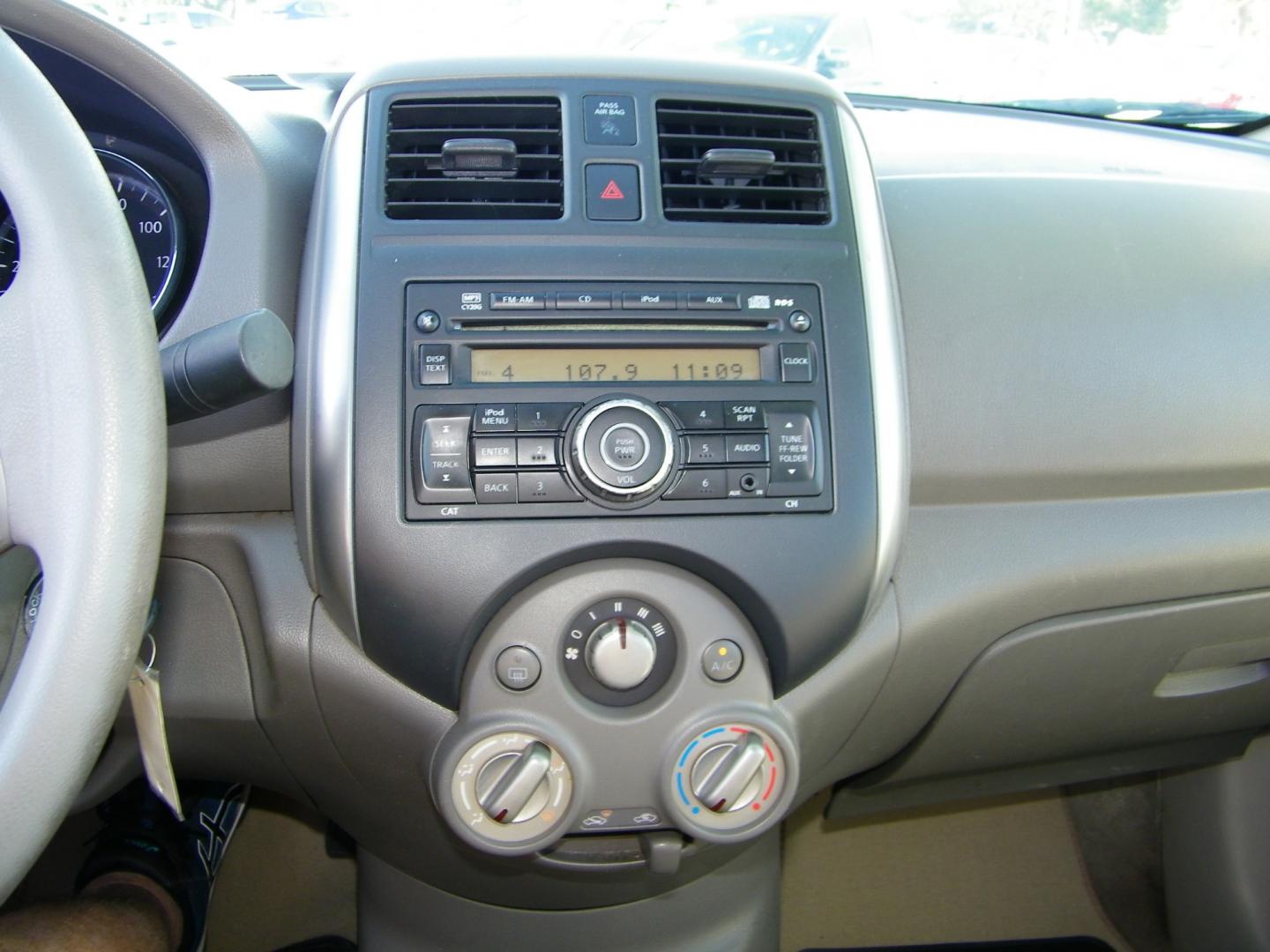 2012 White /Black Nissan Versa SV (3N1CN7AP3CL) with an L4, 1.6L engine, Automatic transmission, located at 4000 Bee Ridge Road, Sarasota, FL, 34233, (941) 926-0300, 27.298664, -82.489151 - Photo#19